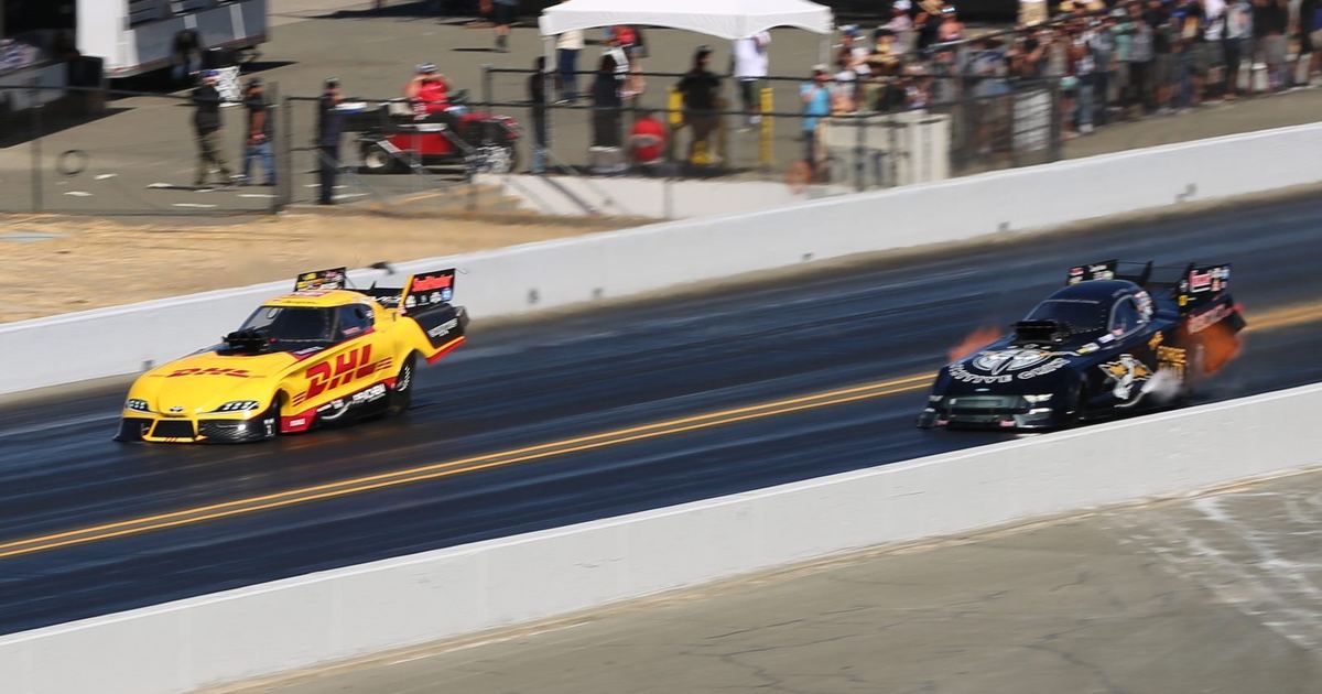 a historic drag racing photograph illustrating the sport's early or mid-century origins