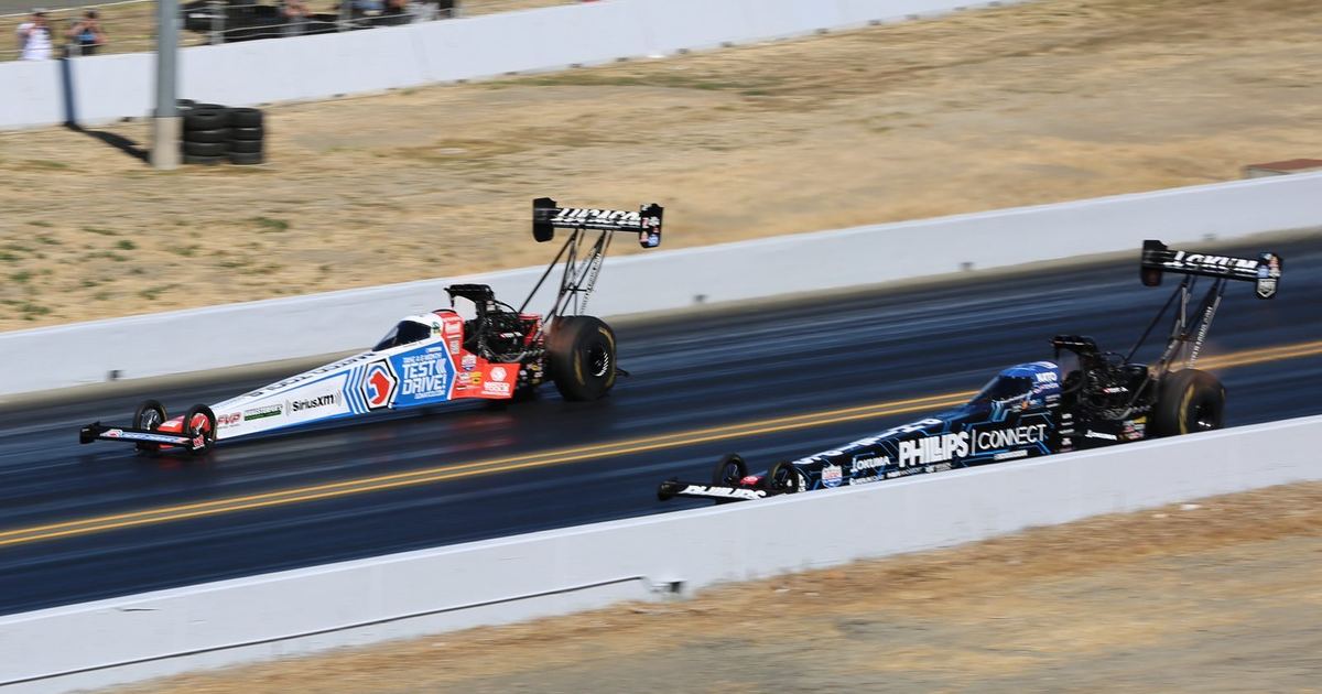an ordinary street car staging at a local drag strip test-and-tune event