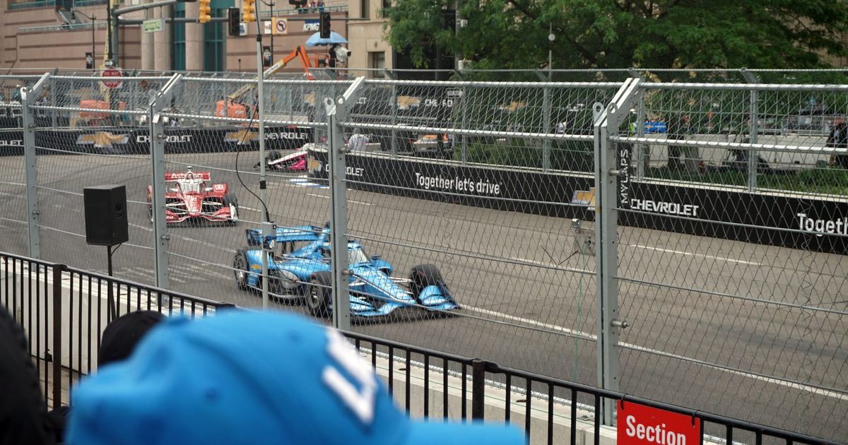 IndyCar practice or qualifying at Indianapolis Motor Speedway, conveying the scale and tradition of the 500
