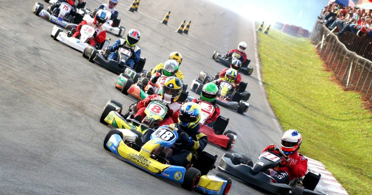 a young competitive kart racer, illustrating karting's role as a training ground for future professional drivers