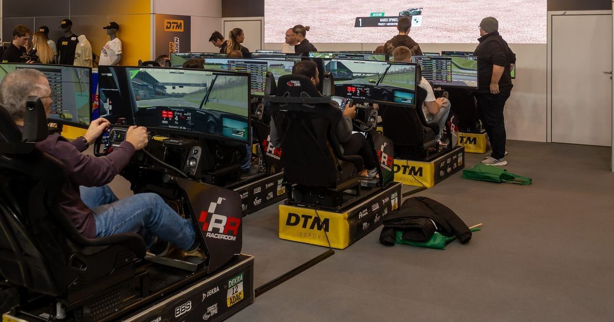 a sim racing cockpit mid-session, conveying the competitive, ranked nature of online sim racing
