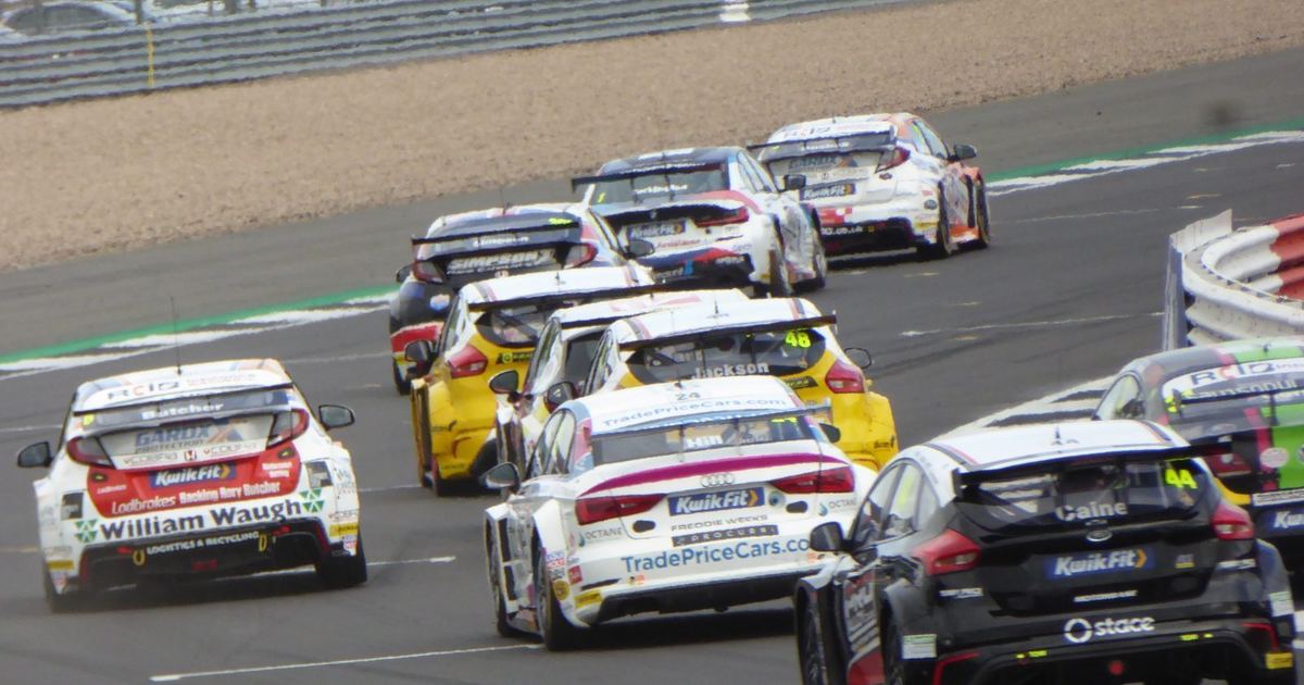 a historic touring car, ideally from the 1990s Super Touring era, illustrating the category's golden age