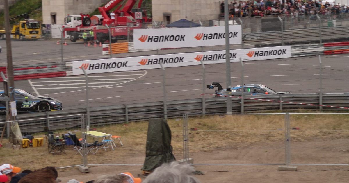 touring cars racing door to door on a road course, contrasted conceptually against oval racing