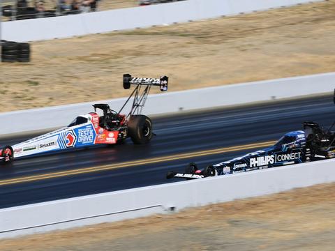 an ordinary street car staging at a local drag strip test-and-tune event
