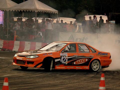 A competition drift car during an event