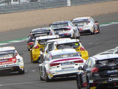 a historic touring car, ideally from the 1990s Super Touring era, illustrating the category's golden age