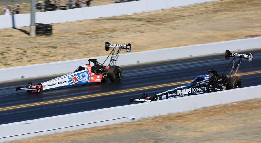 an ordinary street car staging at a local drag strip test-and-tune event