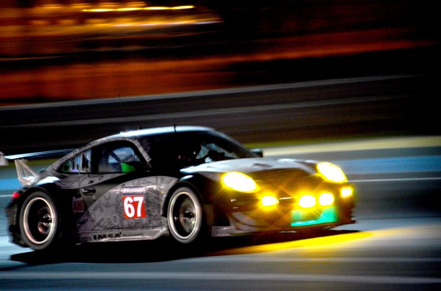 an endurance racing car at night with headlights illuminated, contrasted conceptually against a daytime F1 image