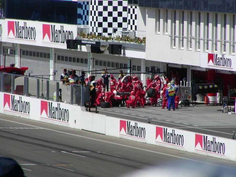 A Ferrari pit stop during the 2003 Hungarian Grand Prix, during one of the team's most dominant competitive periods.