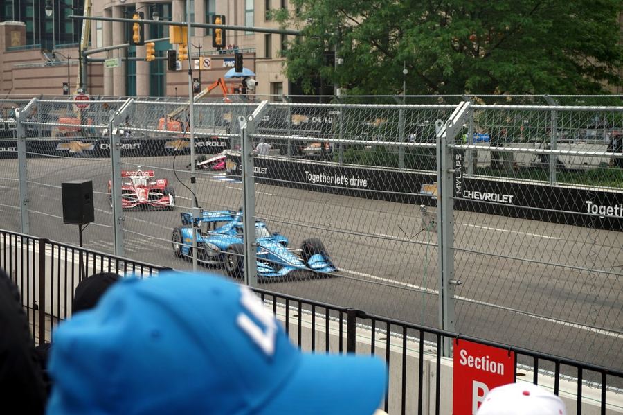 IndyCar practice or qualifying at Indianapolis Motor Speedway, conveying the scale and tradition of the 500