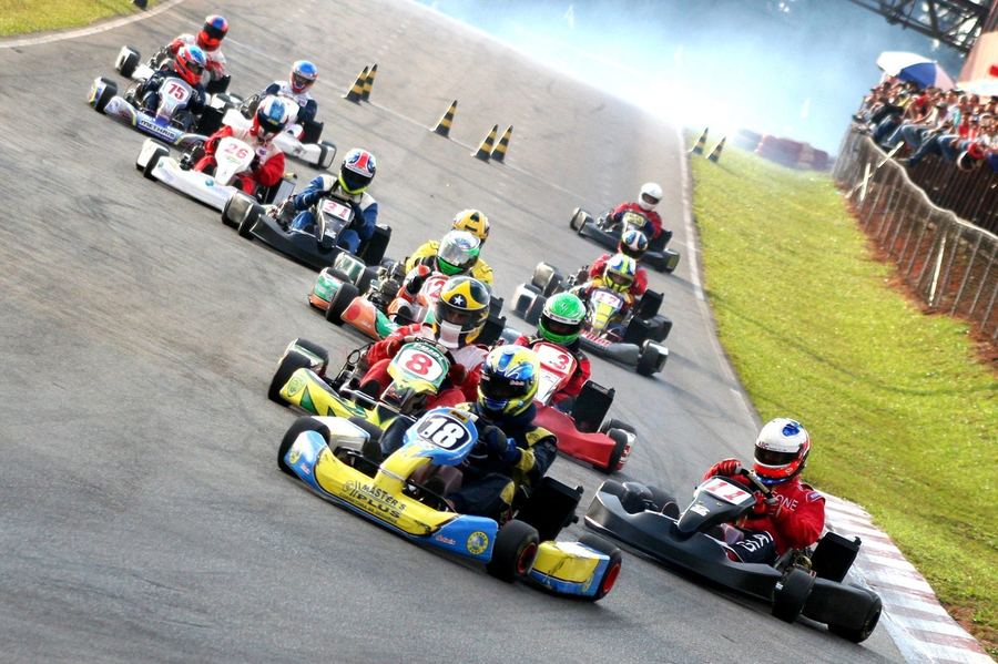 a young competitive kart racer, illustrating karting's role as a training ground for future professional drivers