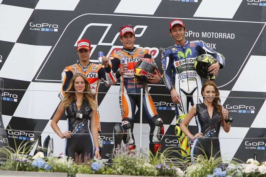 Dani Pedrosa, Marc Marquez and Valentino Rossi racing together at the 2015 German Grand Prix, during the height of MotoGP's most heated modern rivalry.