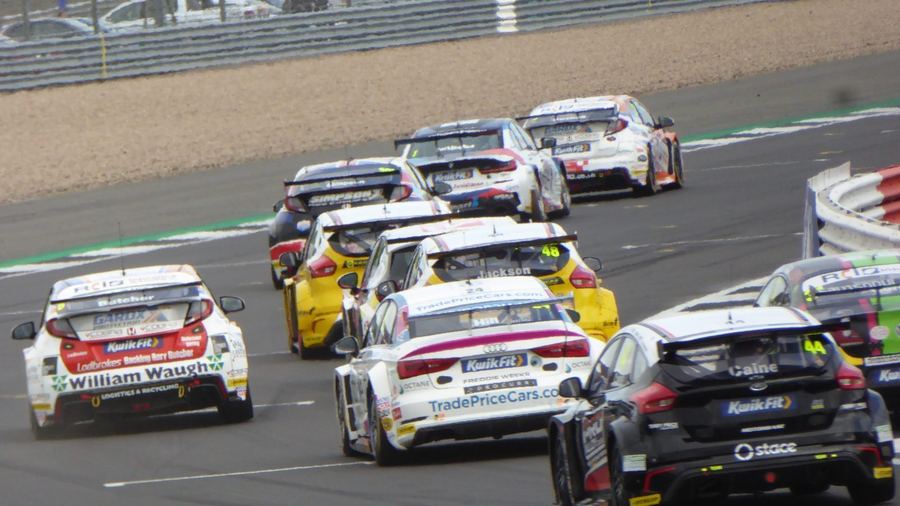 a historic touring car, ideally from the 1990s Super Touring era, illustrating the category's golden age